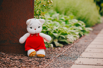 Crochet White Cat Plushie in Red Overalls: Handmade Amigurumi Toy